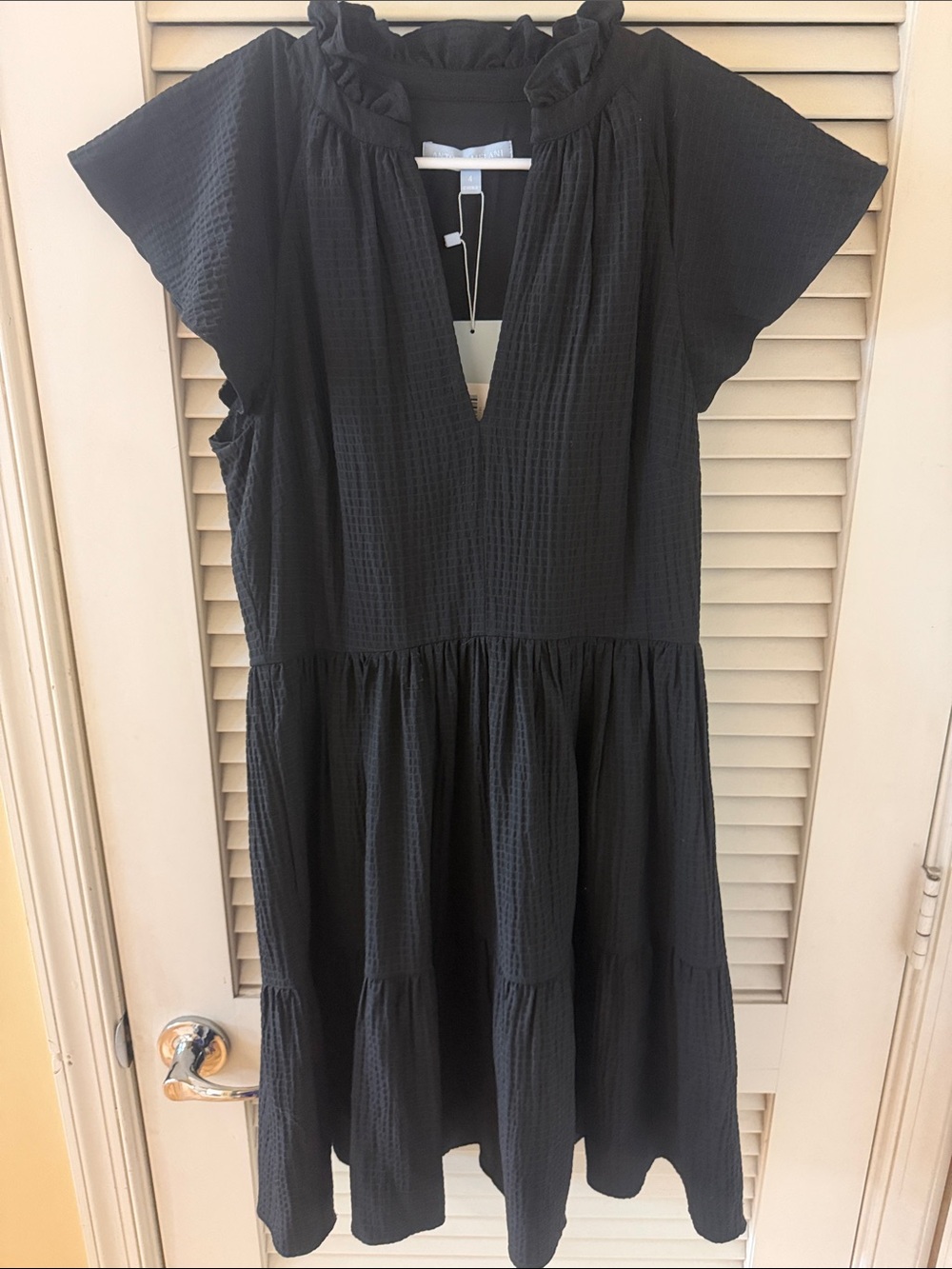 ANTONIO MELANI Black Garment with Light Blue Brand Tag
